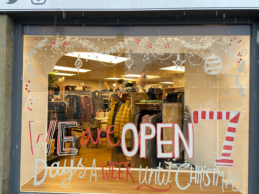 Dare Boutique Dare Boutique, window murals by Jane Middleton Art