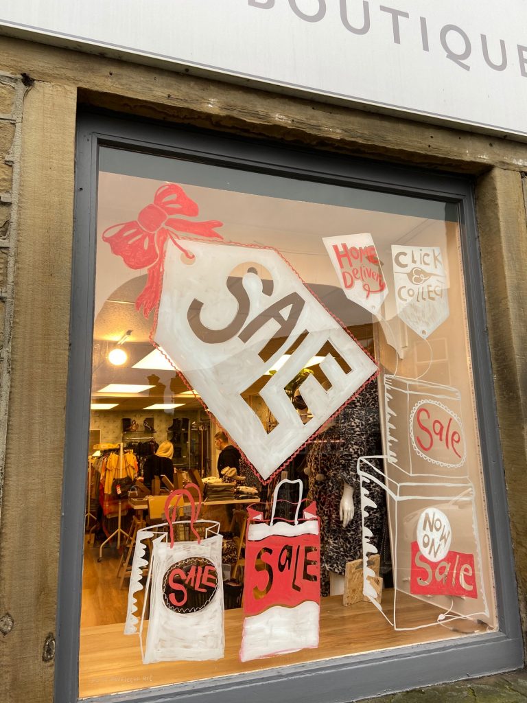 Dare Boutique Dare Boutique, window murals by Jane Middleton Art
