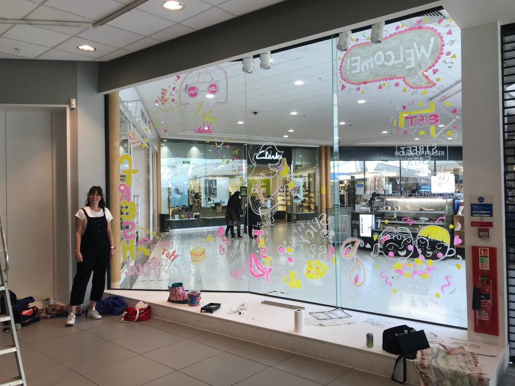 Street Food Kingsgate Centre Huddersfield, window mural by Jane Middleton Art