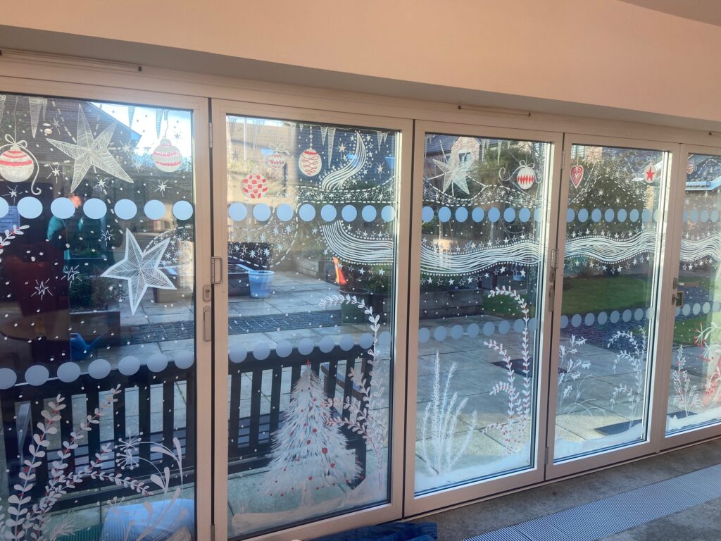 Barnsley Hospice (1) Barnsley Hospice entrance and visitor room window murals depicting a wintery Christmas scene